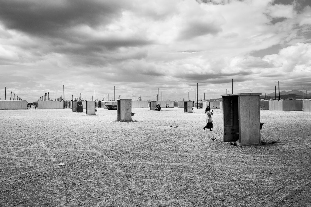 Free standing toilets built before the completion housing structures. One toilet for four households, Blikkiesdorp, 2010.