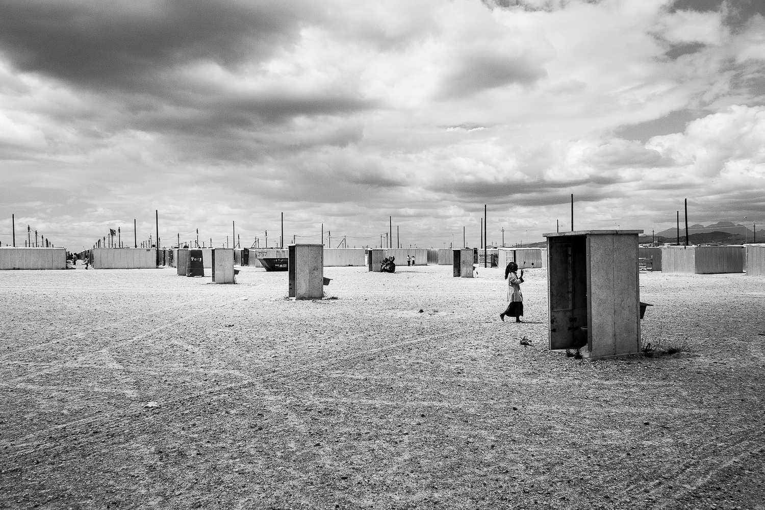 Free standing toilets built before the completion housing structures. One toilet for four households, Blikkiesdorp, 2010.