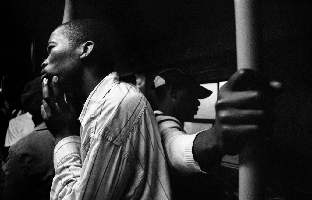 Workers on the night train to Khayelitsha, Cape Town, 2010.